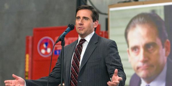 Michael Scott in front of a mic in The Office Stress Relief